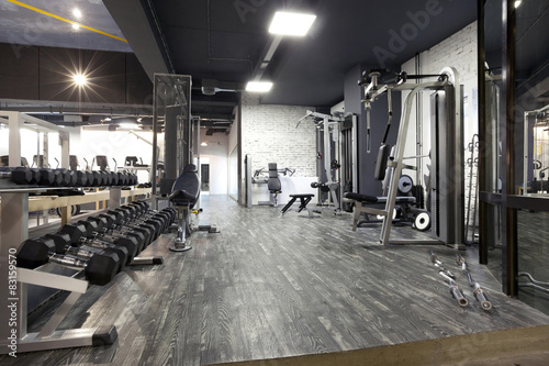 Modern gym interior with various equipment