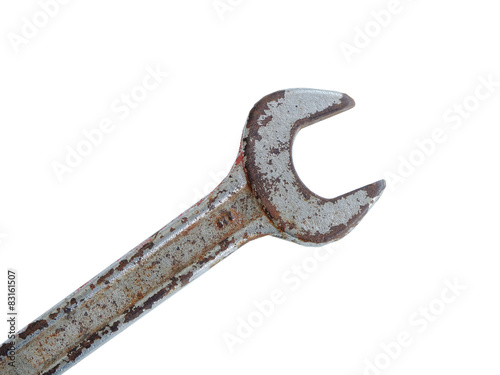 rusted wrench on white