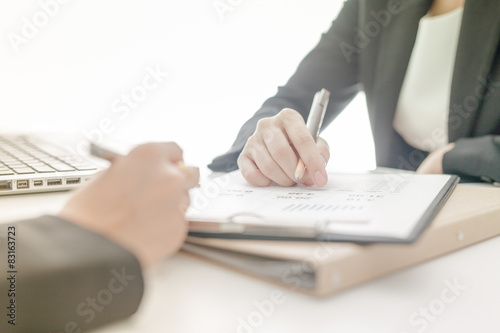 Business people discussing the charts and graphs showing the res
