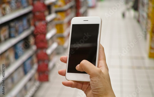 using mobile phone in market