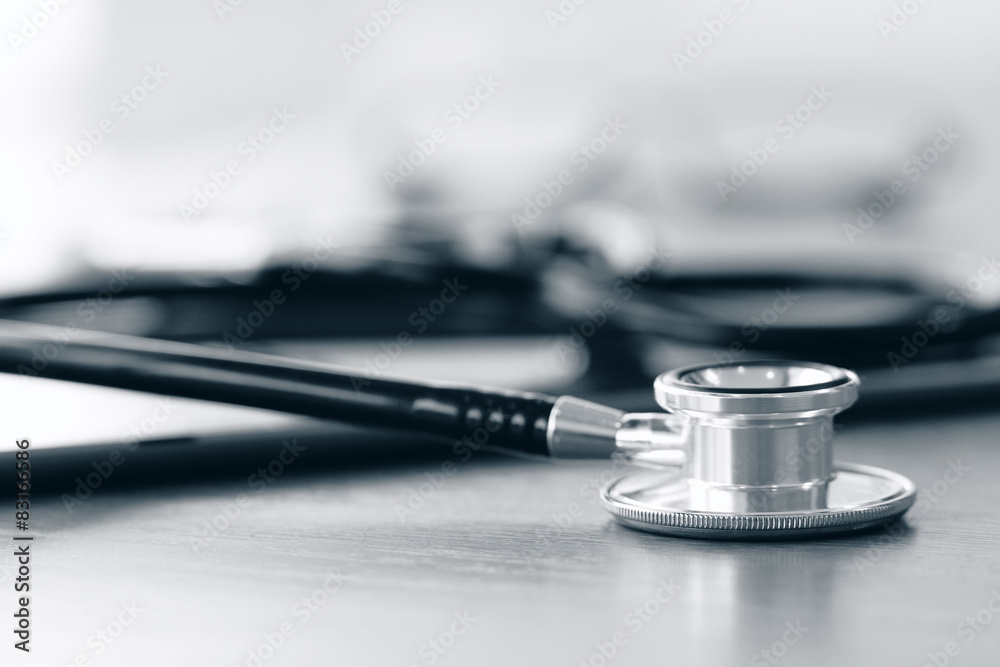 Studio macro of a stethoscope and digital tablet with shallow DO Studio macro of a stethoscope and digital tablet with shallow DO