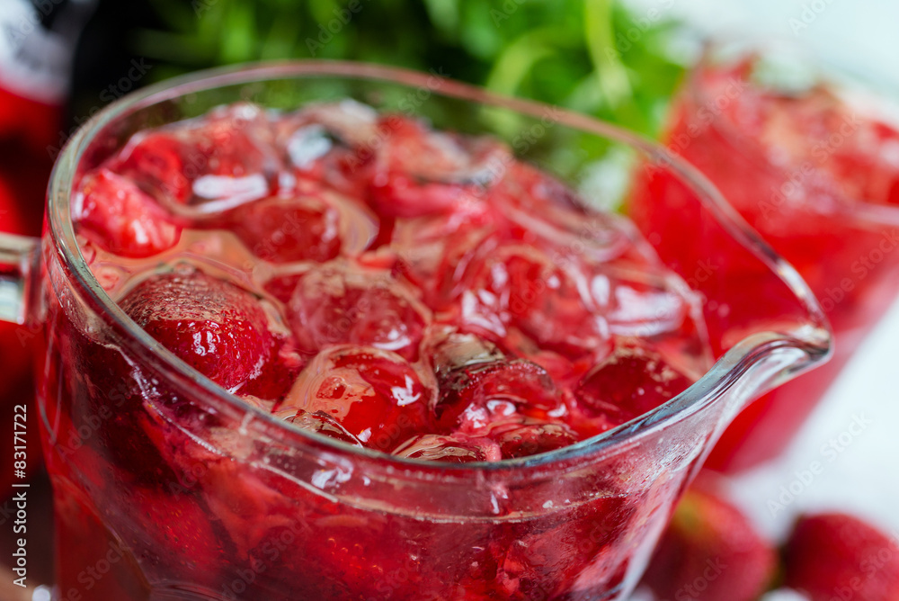 a decanter of bright summer cool refreshing strawberry lemonade a decanter of bright summer cool refreshing strawberry lemonade