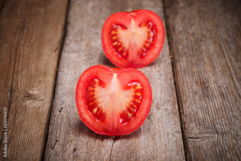 Fresh Organic Tomatoes on the old wooden table Fresh Organic Tomatoes on the old wooden table