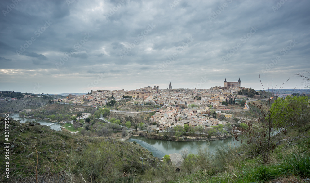 Wide angle view of Toledo with cloudy sky