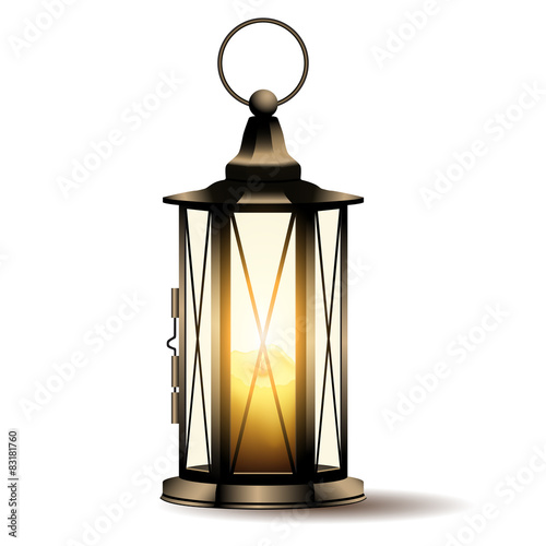 Vintage lantern with candle isolated on white background. photo