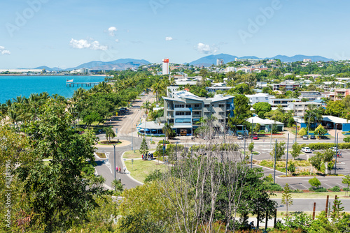 Tropical city in sunny day from aerial view