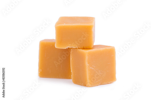 Tasty toffees on a white background.