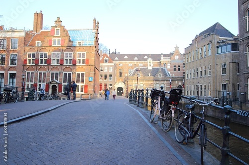 Street with with locked bicycles in Amsterdam