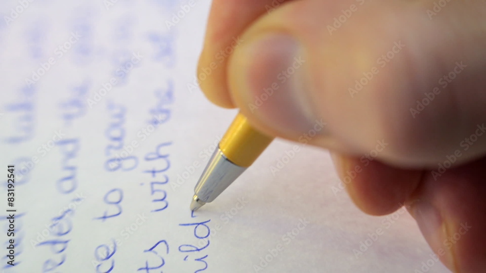 Pen writes a letter on paper Pen writes a letter on paper