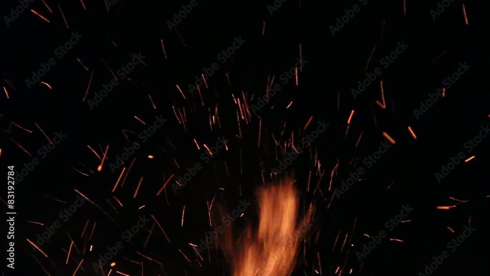 Huge sparks, flying from a fire
