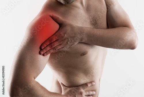 Foto Shoulder joint fracture. Young man having rheumatism problem