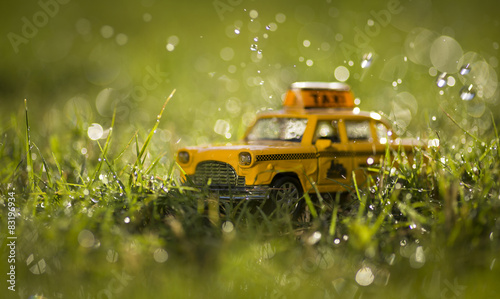 Taxi under the rain.