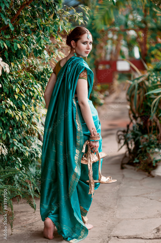 The girl in the blue Indian costume. The girl in the blue Indian costume.