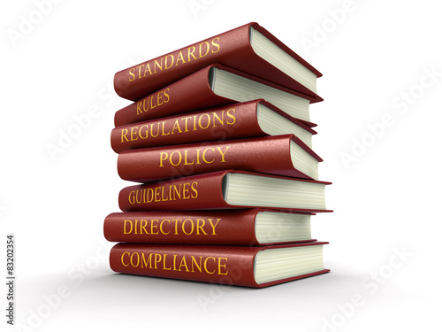 Stack of compliance and rules books (clipping path included)