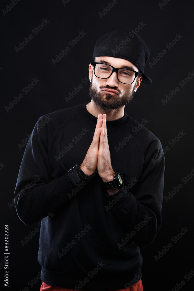 Charismatic guy in a black sweater , emotions Charismatic guy in a black sweater , emotions