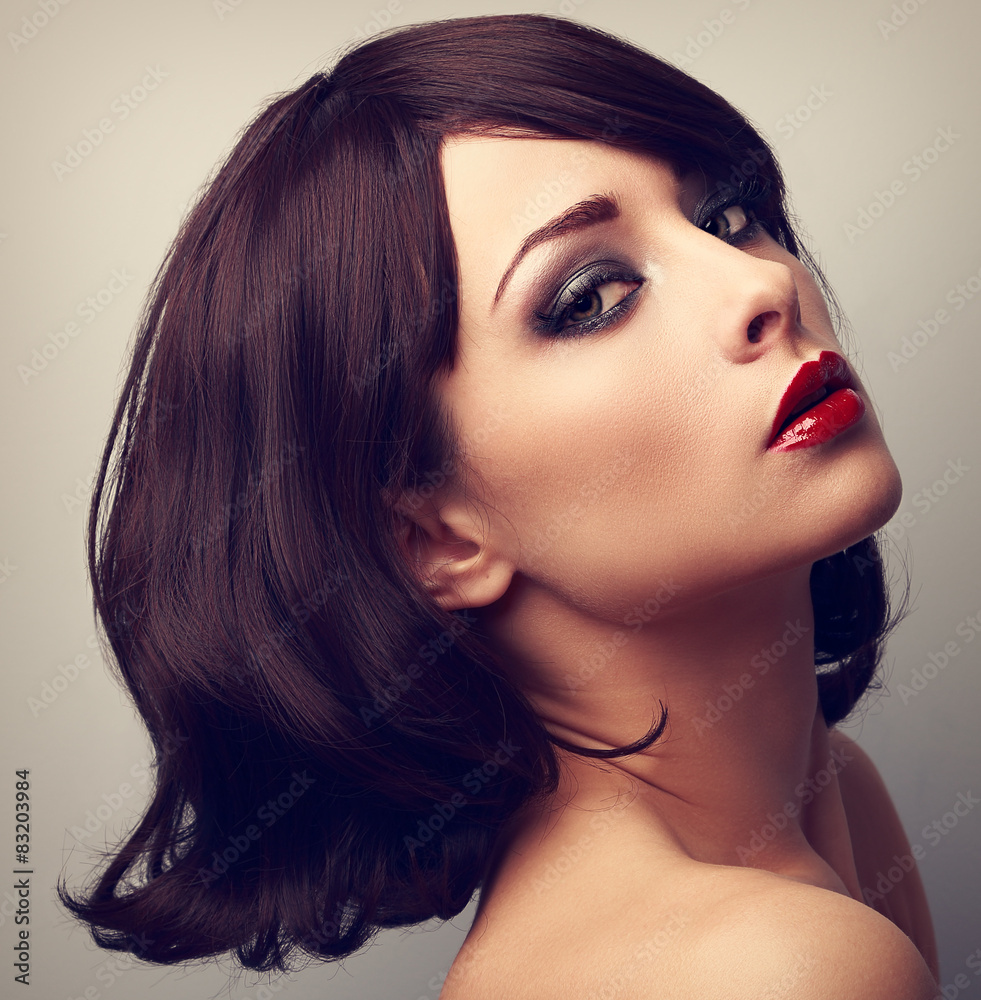 Fototapeta premium Beautiful makeup profile of black hair woman. Closeup vintage po