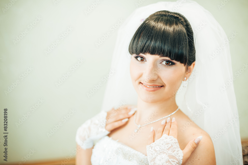 beautiful bride getting ready in white wedding dress with beautiful bride getting ready in white wedding dress with