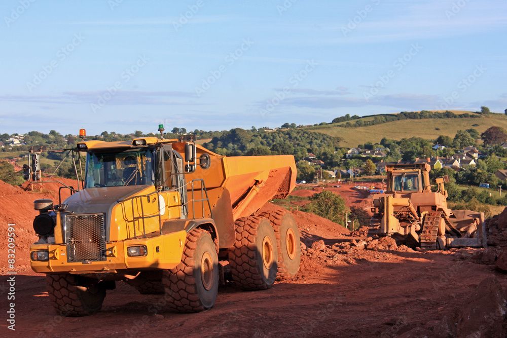 Obraz premium Dump truck and bulldozer