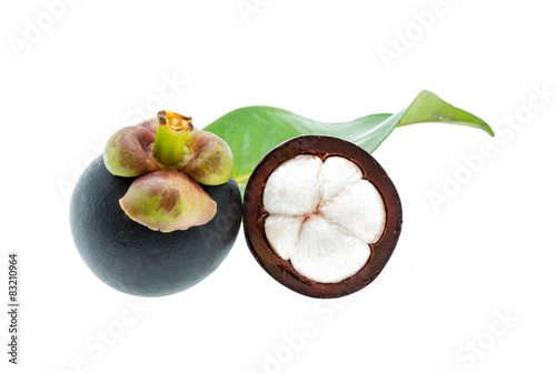 Mangosteen fruit and cross section showing the thick purple skin