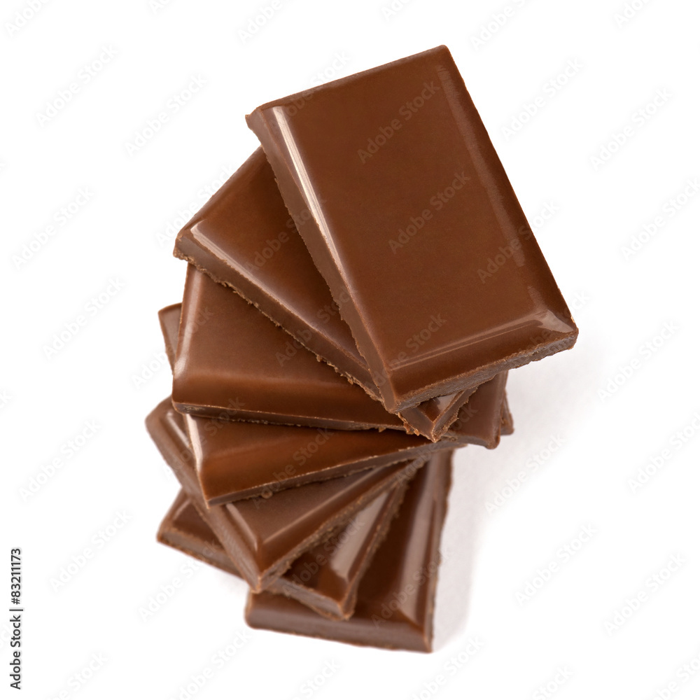 Stack of broken milk chocolate bars close up Stack of broken milk chocolate bars close up