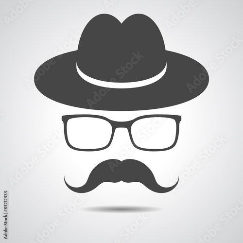 black hat with mustache and glasses isolated on a grey backgroun