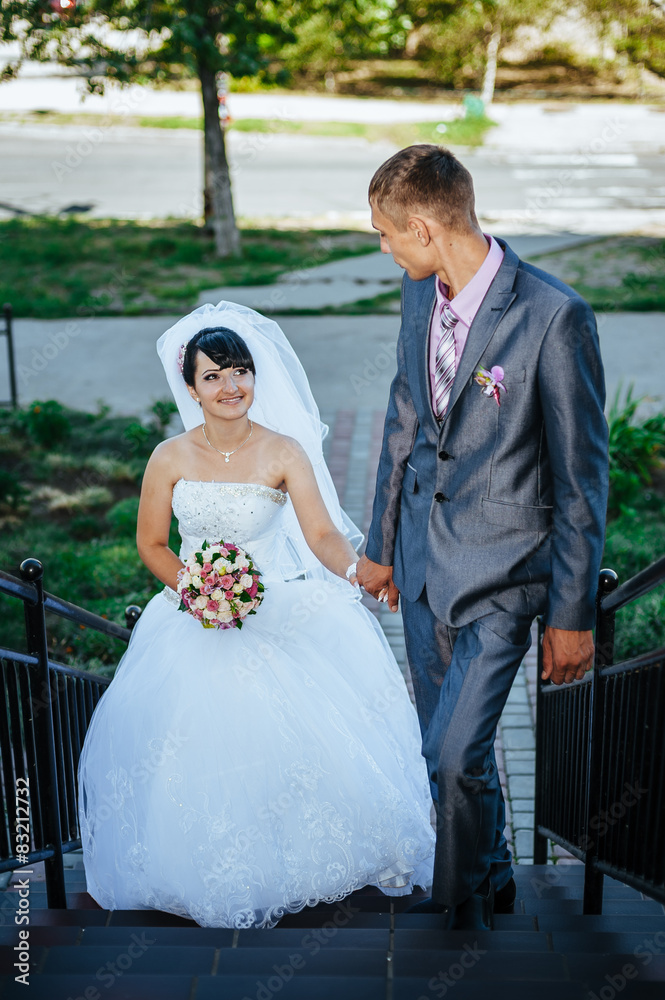 Charming bride and groom on their wedding celebration in a
