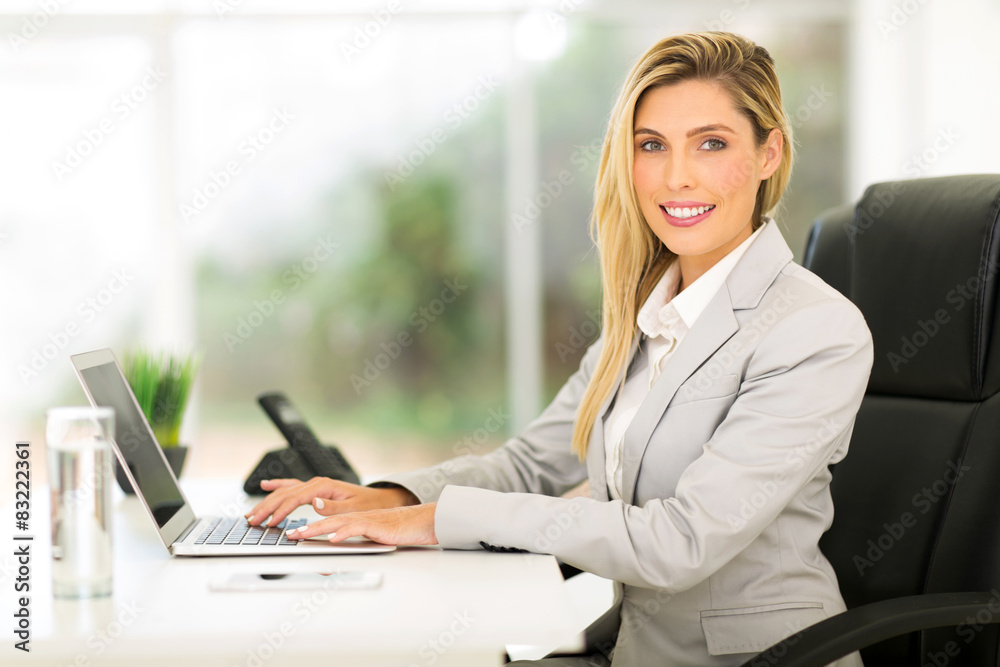 businesswoman using laptop computer businesswoman using laptop computer