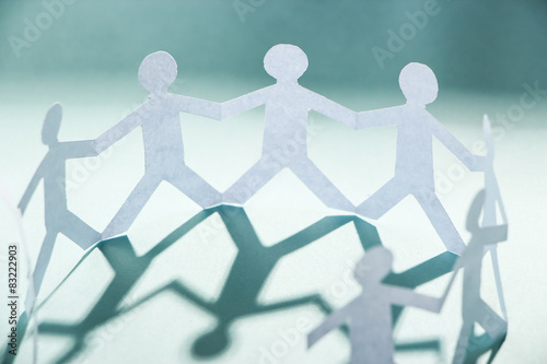 Group of people holding hands