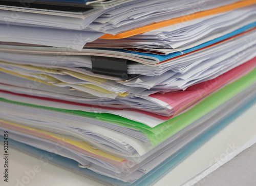 Pile of document on desk