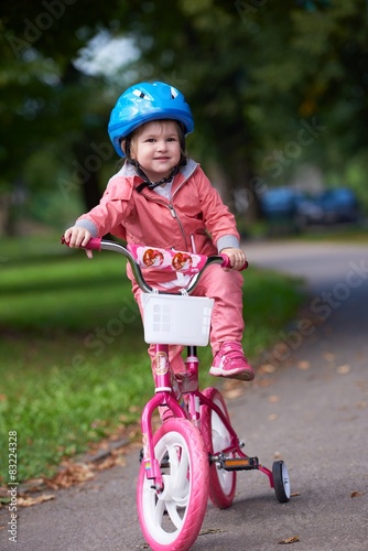 little girl with bicycle