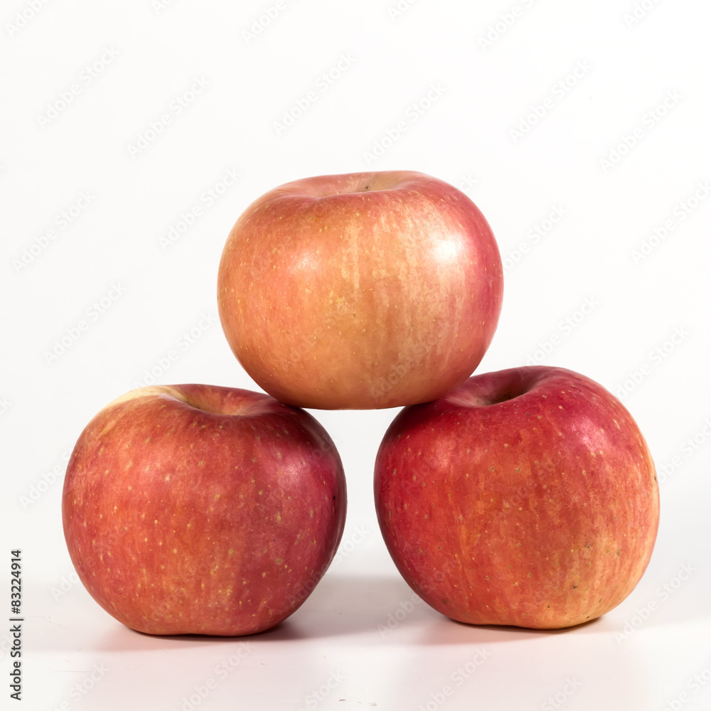Three fresh red apples, isolated on white Three fresh red apples, isolated on white