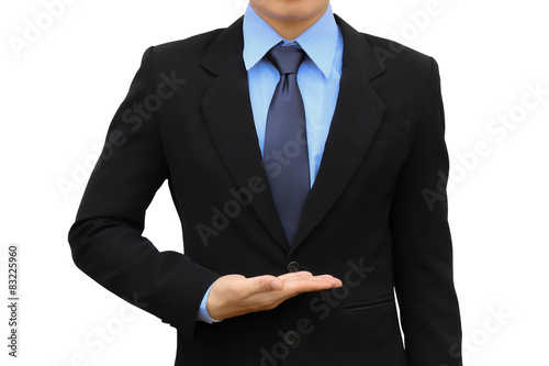 Business man holding black suit isolated.