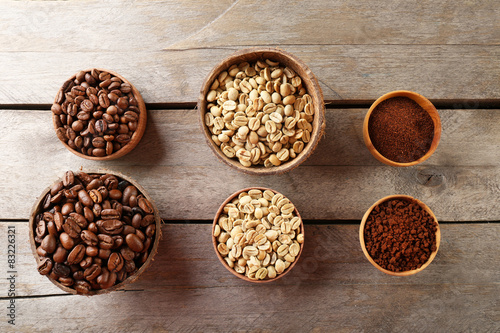 Various of coffee in small dishes on wooden table, top view