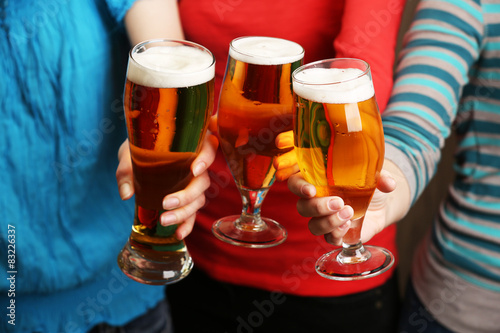 Beer in female hands, closeup