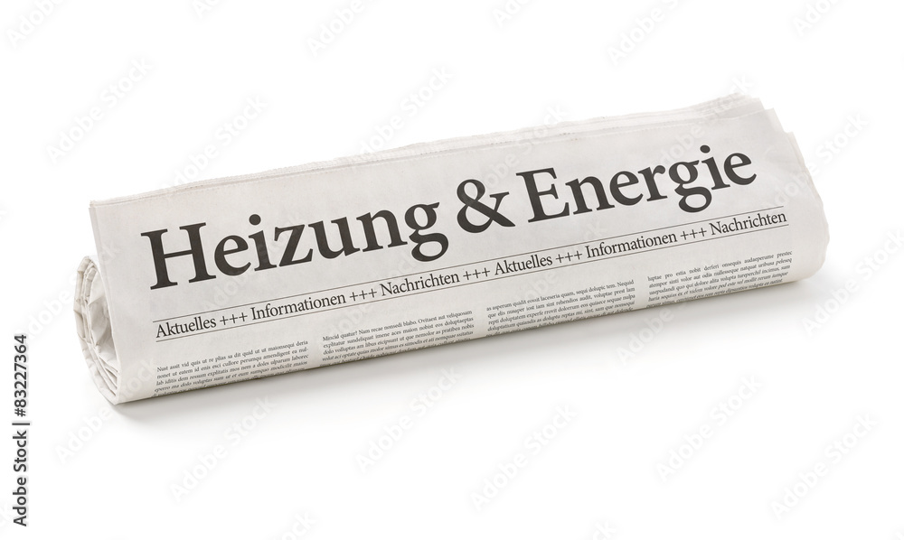 Obraz premium Zeitungsrolle mit der Überschrift Heizung und Energie