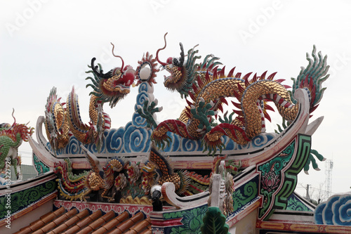 Dragon statue on the roof © seagames50