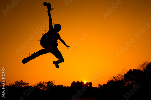 Silhouette of Man jumping - color tone tuned