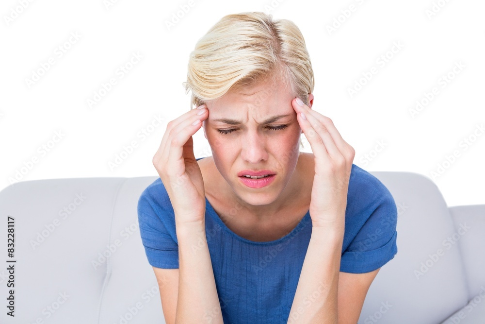 Attractive blonde woman having headache Attractive blonde woman having headache