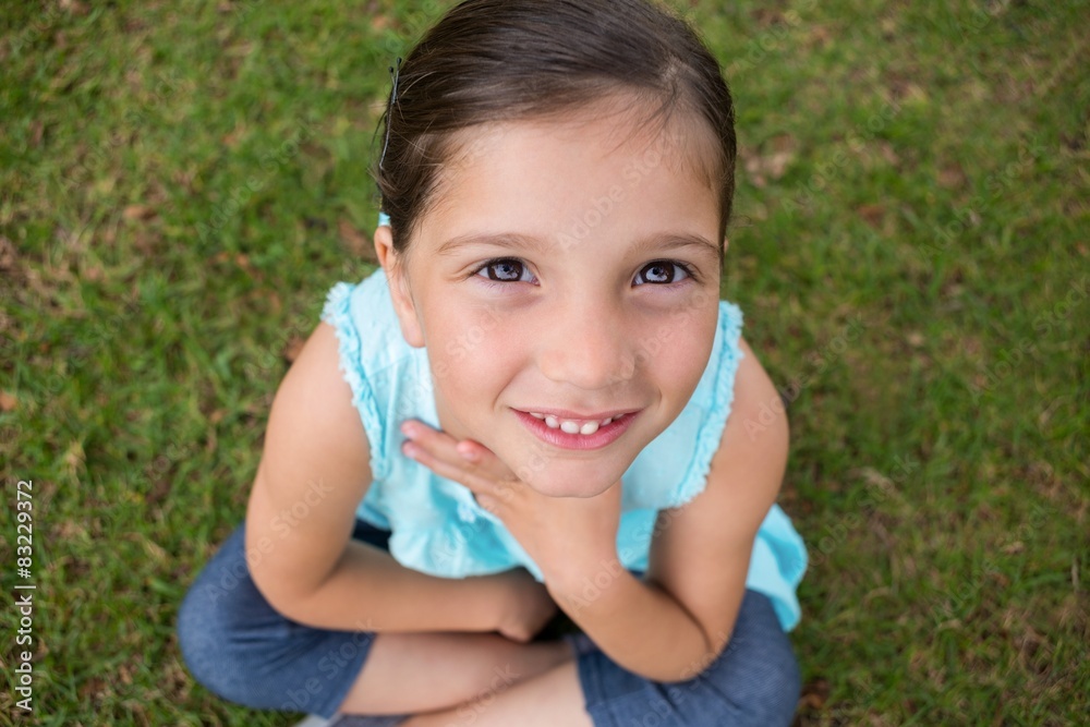 Little girl looking up at camera Little girl looking up at camera