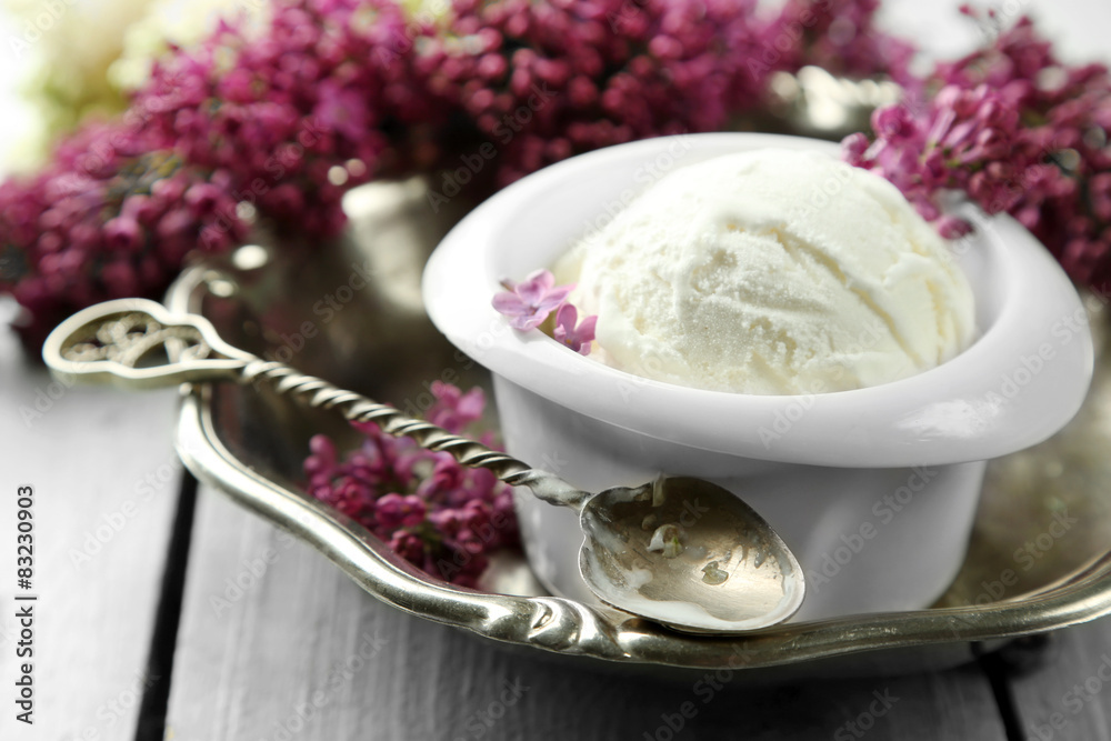Beautiful composition with tasty ice cream and lilac flowers Beautiful composition with tasty ice cream and lilac flowers