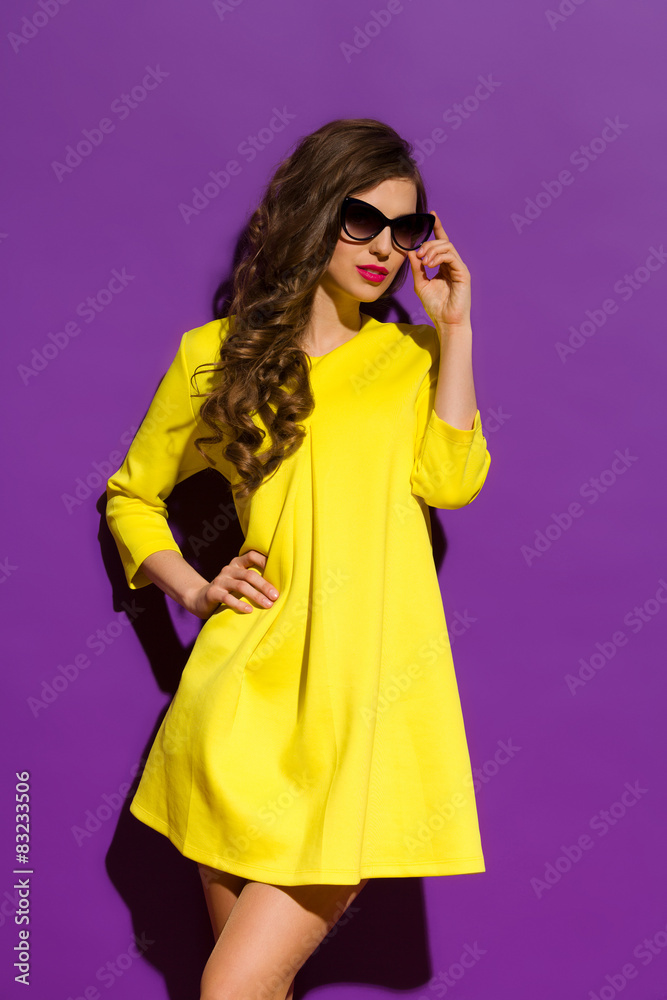 Fashion Model Posing On a Violet Background