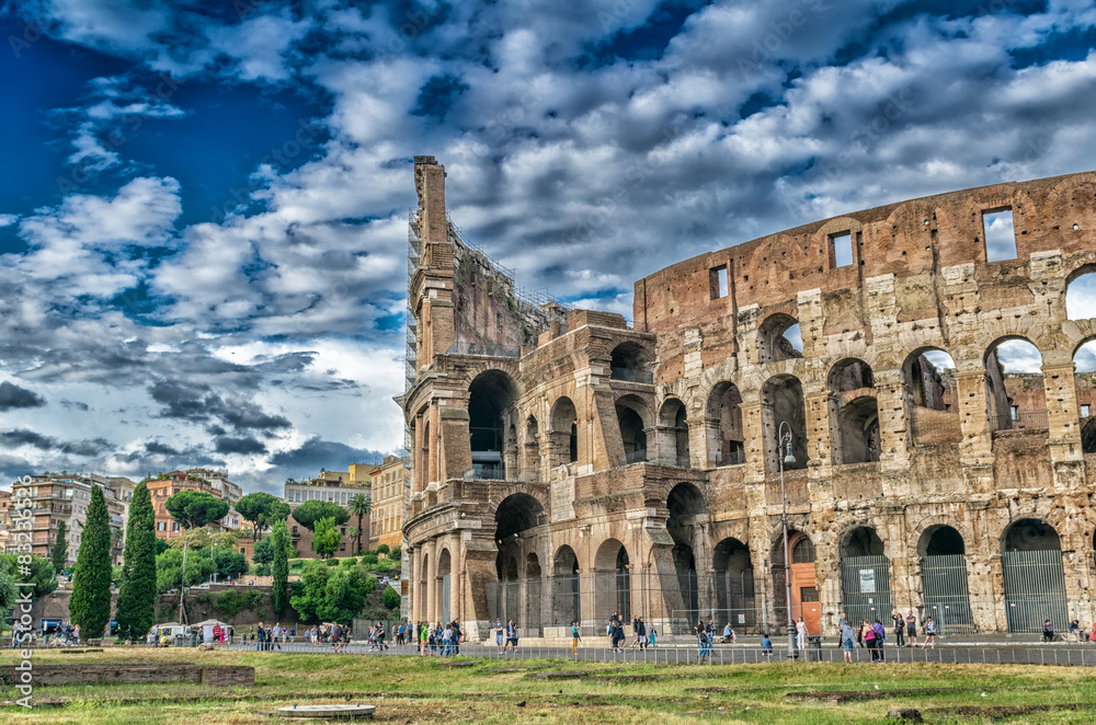 Fototapeta premium ROME - MAY 20, 2014: Tourists visit Colosseum. The city is visit