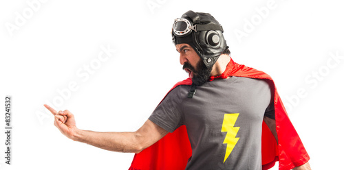 Superhero shouting and pointing lateral