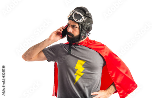 Superhero talking to mobile