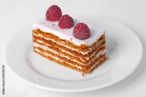 Piece of cake with a raspberry