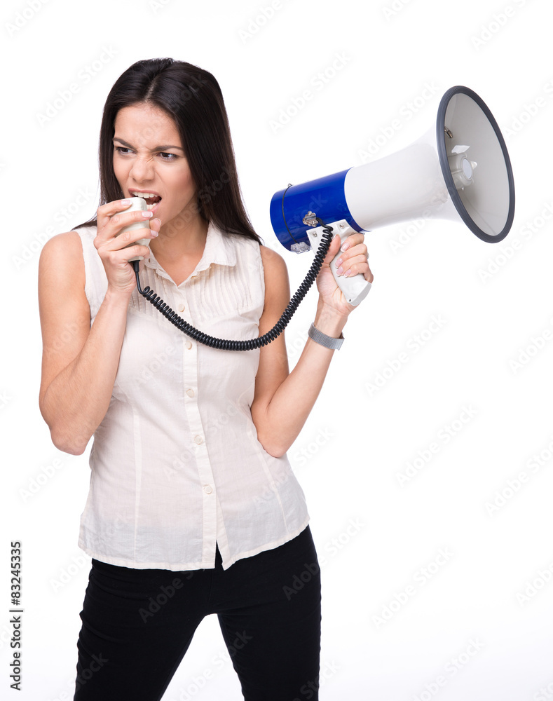 Businesswoman shouting in loudspeaker Businesswoman shouting in loudspeaker