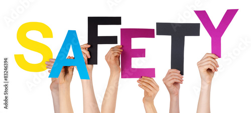 Many People Hands Holding Colorful Word Safety  photo
