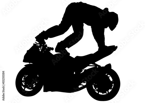 Motorcyclist performed extreme stunts on a white background