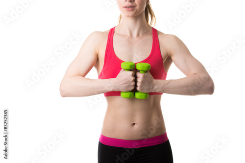 Dumbbell weights in female hands