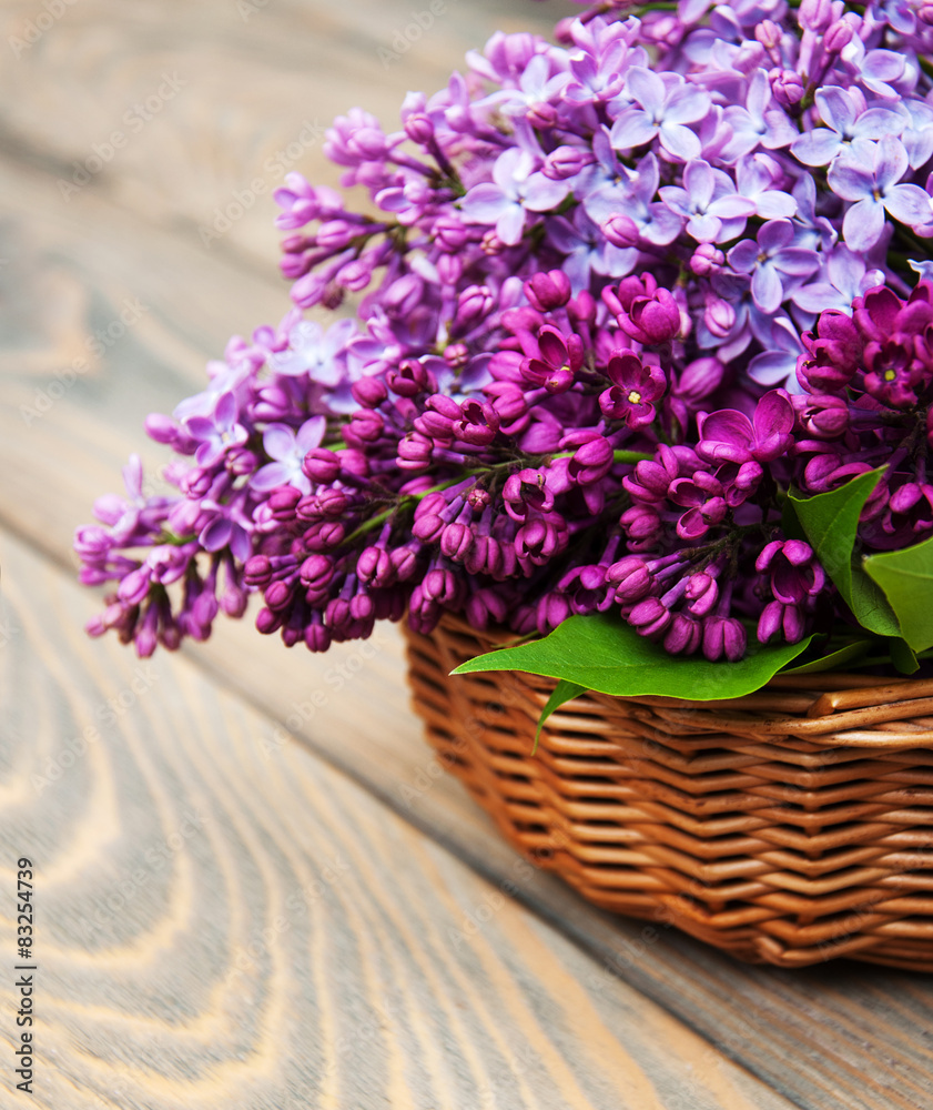 Basket with lilac flowers